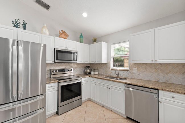 2442 Sw Regency Rd, House other with 3 bedrooms, 2 bathrooms and null parking in Stuart FL | Image 7