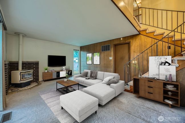 Lower level also has access to the garage where you will find room for 2 vehicles, the washer and dryer, furnace and hot water heater. *Photo is virtually staged. | Image 21