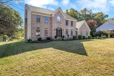 View of front facade with a front yard | Image 3