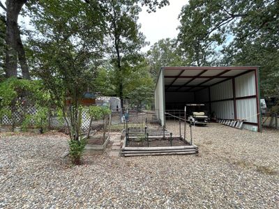 View of yard with an outdoor structure | Image 2