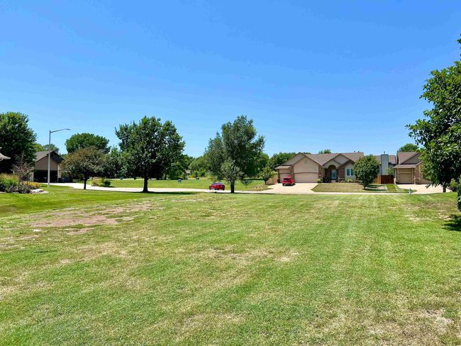 View of yard featuring a garage | Image 9