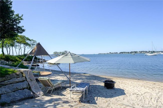 One of two private sandy beaches on the property | Image 6
