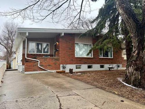 1105 and 1107 11 St S, Lethbridge, AB, T1K1P7 | Card Image