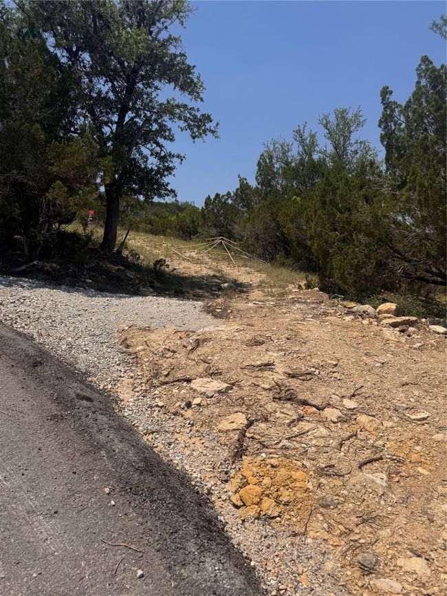 Photo shows easement road in order to get to the property. | Image 12