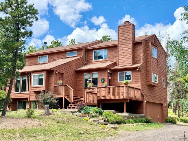 Unparalleled beauty of living in the Rocky Mountains of Colorado. Nestled amidst breathtaking scenery, this home offers crisp, fresh air, and a serene natural setting. | Image 29