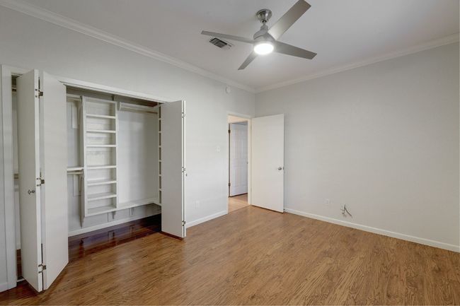 Great built-in storage in the 2nd bedroom closet. | Image 19