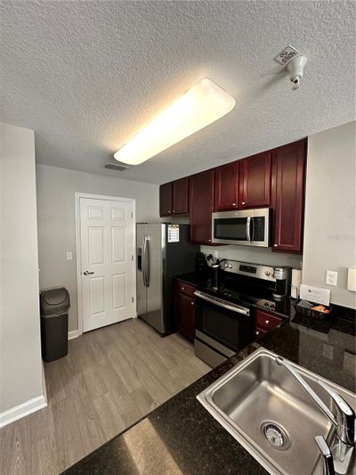 14052 Grove Resort Avenue, Condo with 2 bedrooms, 2 bathrooms and null parking in Winter Garden FL | Image 1