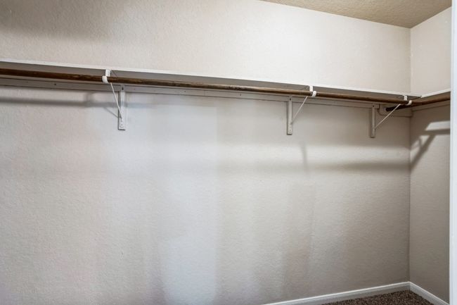 View of spacious closet | Image 14
