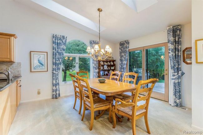 Dining Area with Vaulted Ceiling and Gorgeous Natural Light | Image 10