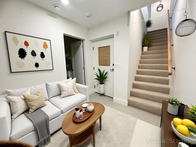 Living room with stairway, baseboards, and light carpet | Image 15