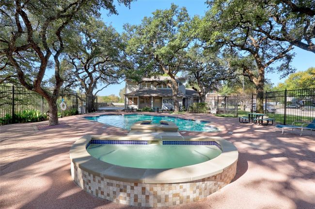 Community pool featuring a patio and an in-ground hot tub | Image 17