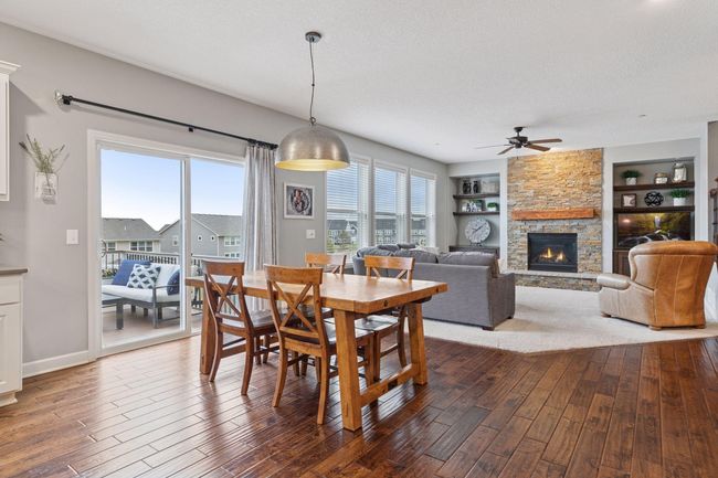 Sliding glass door leads to the maintanence free deck for added entertaining options | Image 11