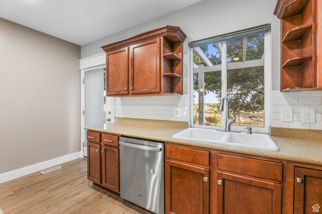 Kitchen with access to patio | Image 16