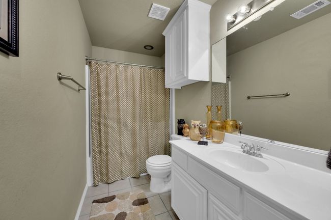 Bathroom featuring vanity and tile patterned floors | Image 29