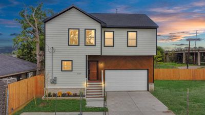 1217 Cabell Street has a lovely elevation featuring an inset wood detail at the garage and entry door! A pocket development, this is one of two homes planned - and the neighborhood has no HOA fees! | Image 2