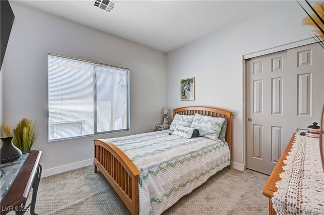 Bedroom featuring carpet flooring and a closet | Image 18