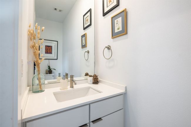 Bathroom with visible vents and vanity | Image 14