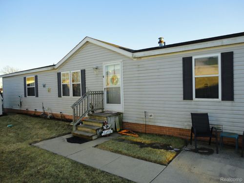 935 Tanners Lndg, Raisinville Twp, MI, 48161-4590 | Card Image