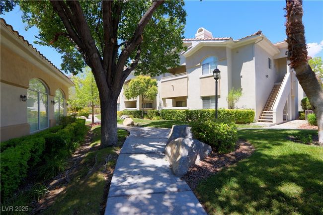 View of community with a lawn and stairway | Image 24