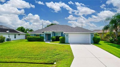 3454 Se Hart Circle, House other with 4 bedrooms, 3 bathrooms and null parking in Port St Lucie FL | Image 3