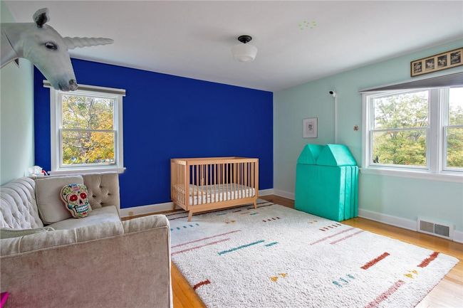 First floor bedroom with hardwood | Image 15
