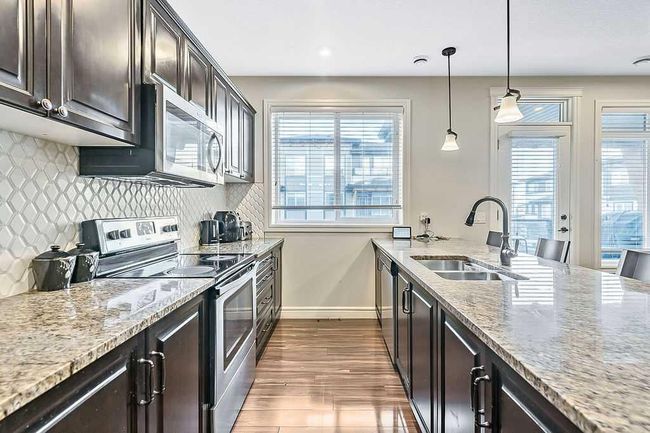 237 Savanna Walk Ne, Townhouse with 3 bedrooms, 3 bathrooms and 2 parking in Calgary AB | Image 5