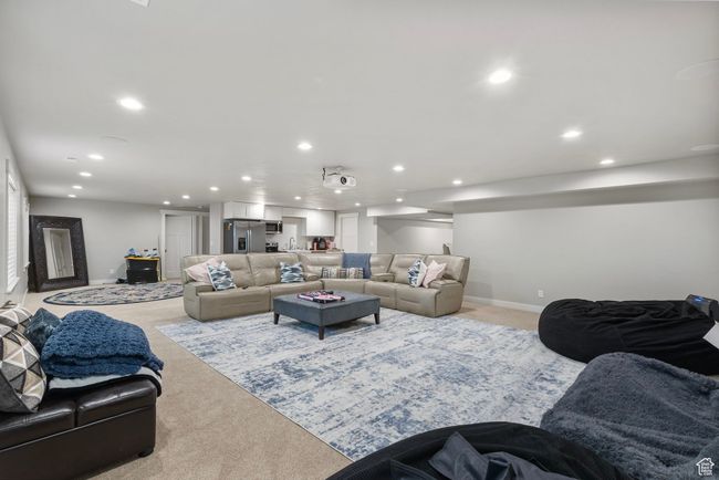 Living room featuring recessed lighting and light colored carpet | Image 29