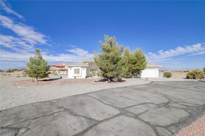 Welcome home! The large driveway gives you ample parking. | Image 1