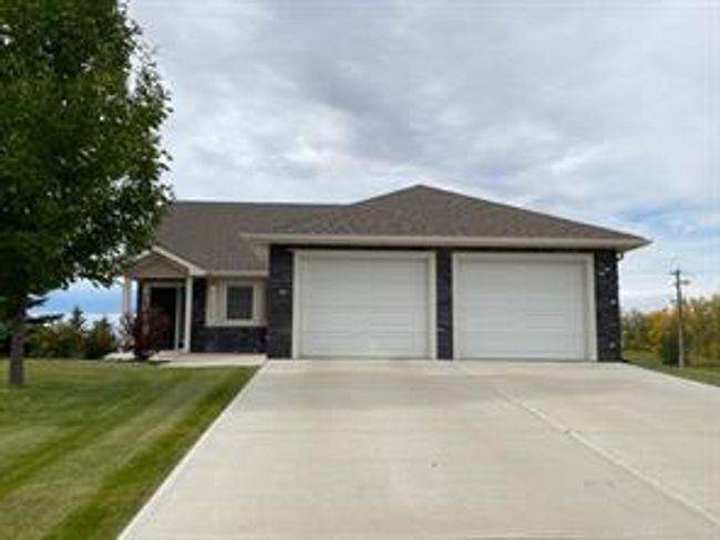 909 Whispering Dr, House detached with 4 bedrooms, 2 bathrooms and 2 parking in Vulcan AB | Image 1