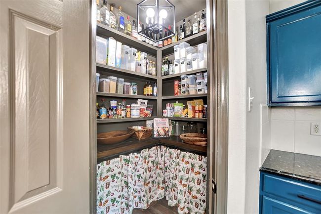 This custom-designed pantry offers optimized storage and functionality. | Image 23