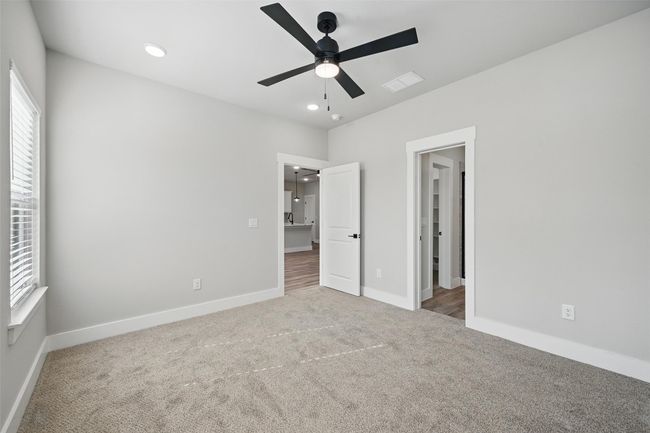 Unfurnished bedroom featuring visible vents, carpet, baseboards, ceiling fan, and recessed lighting | Image 15