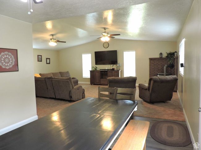 Dining Open to Great Room with Vaulted Ceilings | Image 16