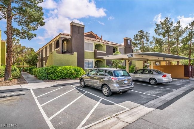 View of partially covered parking lot | Image 4