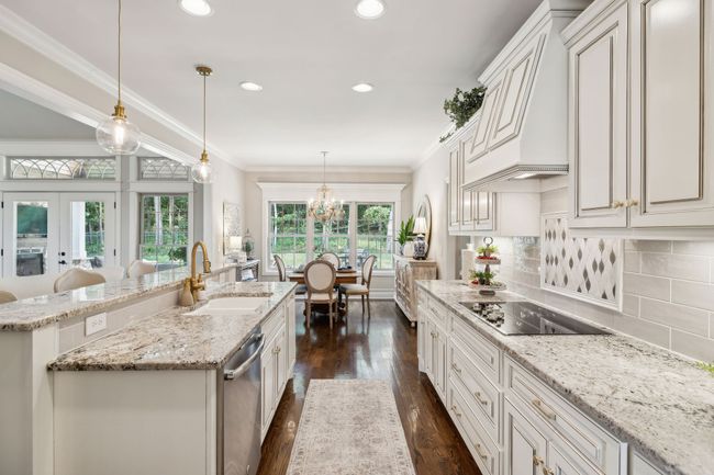 Tile back splash, granite counters, quality cabinetry with accent glaze! | Image 16
