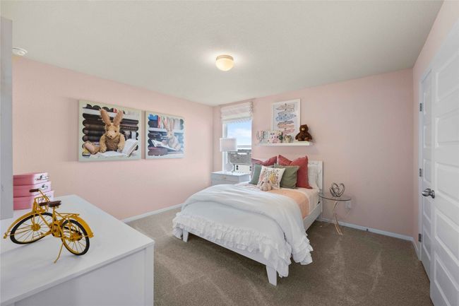 Carpeted bedroom featuring baseboards | Image 24
