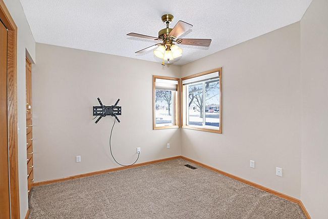 SECOND BDROOM WITH CLOSET AND BUIL-IN DRESSER | Image 9