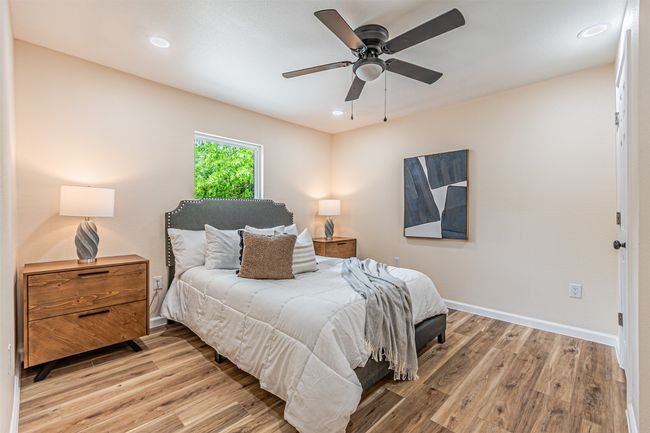 Bedroom featuring recessed lighting, ceiling fan, baseboards, and light wood-type flooring | Image 13