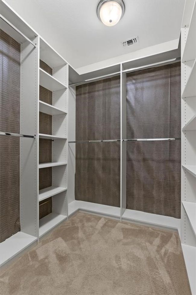 Primary walk-in closet | Image 18