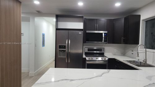 front-2310 Nw 103rd St, Miami, FL, 33147-1749 | Card Image