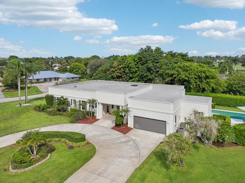 257 N Country Club Dr, Atlantis, FL, 33462-1113 | Card Image