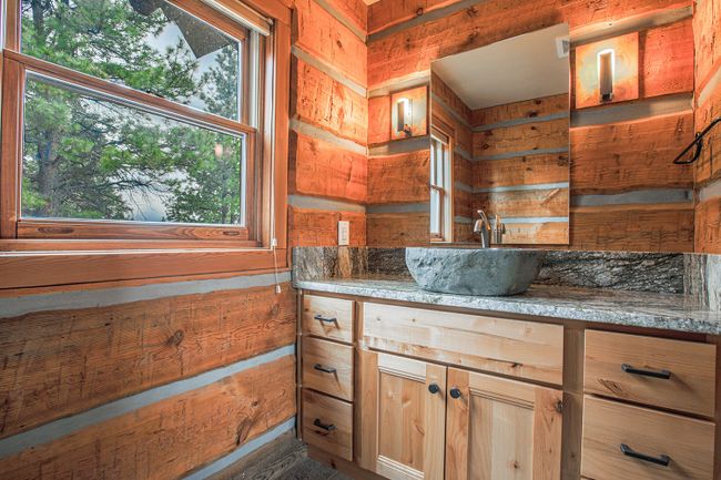 half bathroom off of side entrance | Image 28