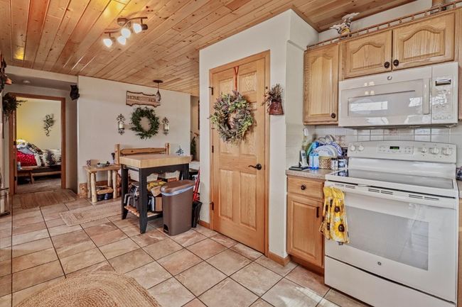 8631 N Bo Di Lac Dr, House other with 3 bedrooms, 2 bathrooms and 6 parking in Minocqua WI | Image 9