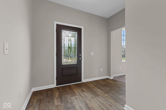 Nice foyer with wood finished floors | Image 4