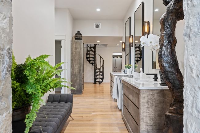 Primary bathroom. flooring, stairs, and recessed lighting | Image 25