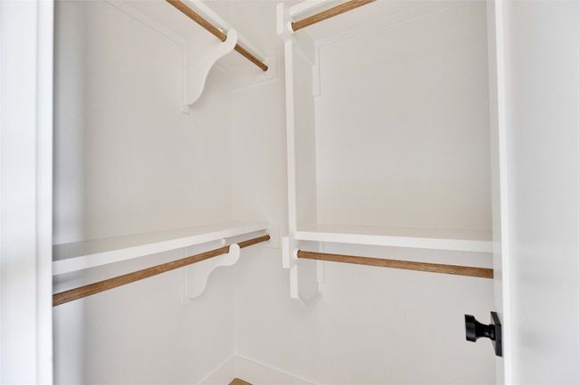 View of spacious closet | Image 16