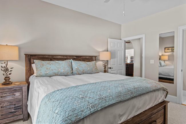 Main level guest room with ensuite bath | Image 31
