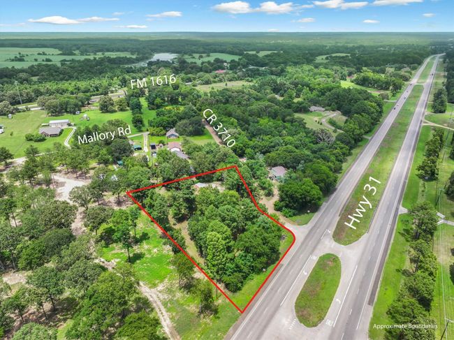 Aerial view of property and surrounding area featuring property parcel outlined | Image 38