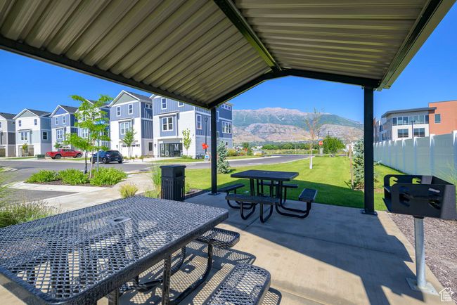 View of patio with a mountain view, a residential view, and outdoor dining area | Image 19