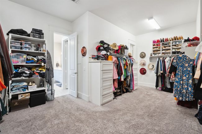 Walk in closet featuring carpet flooring | Image 23
