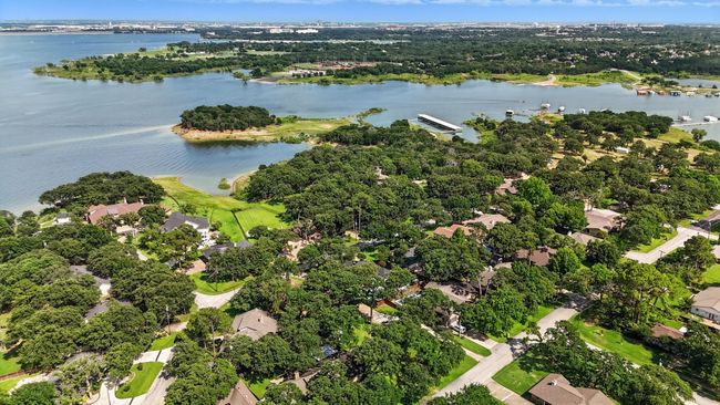 View of property location featuring a nearby body of water and nearby suburban area | Image 12